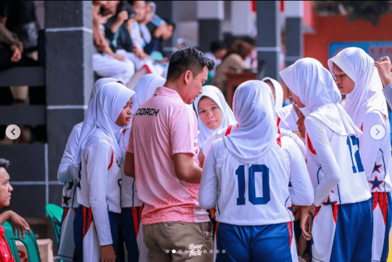 Youth basketball players practicing dribbling drills